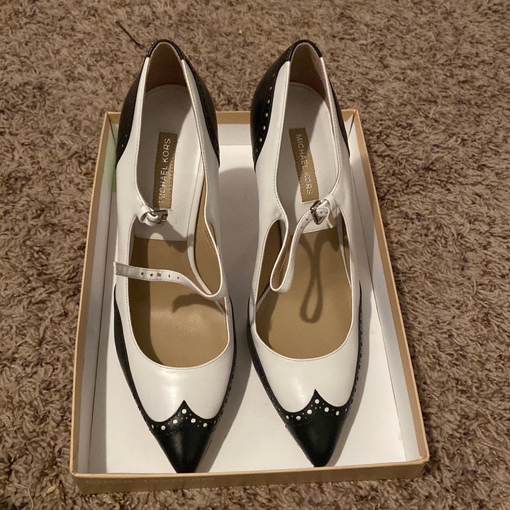 Beautiful NIB Michael Kors spectator pump. Never worn! Size 39